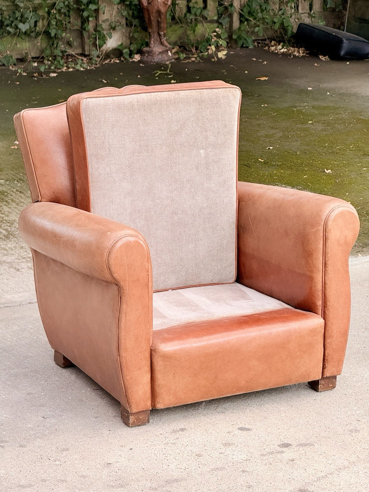 Art Deco club armchair with seat cushion removed, showing base upholstery