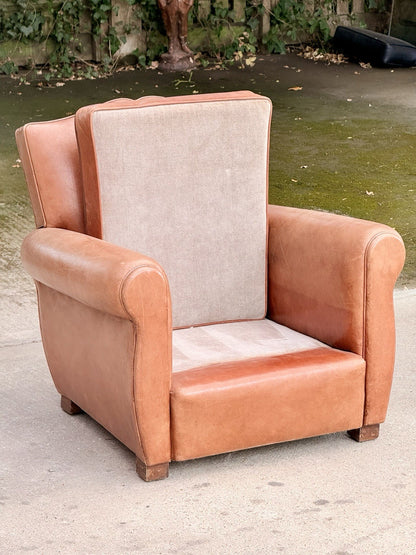 Art Deco club armchair with seat cushion removed, showing base upholstery