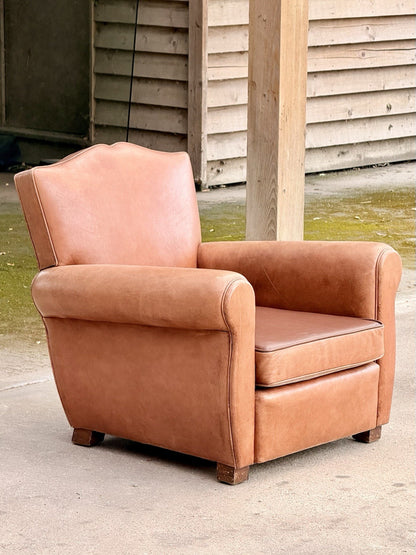 French Art Deco moustache leather club armchair, three-quarter view