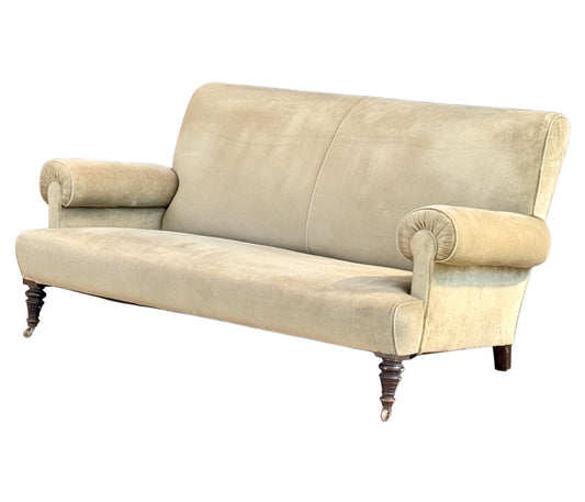 Neo-classical sage velvet sofa, three-quarter view showing scroll arms