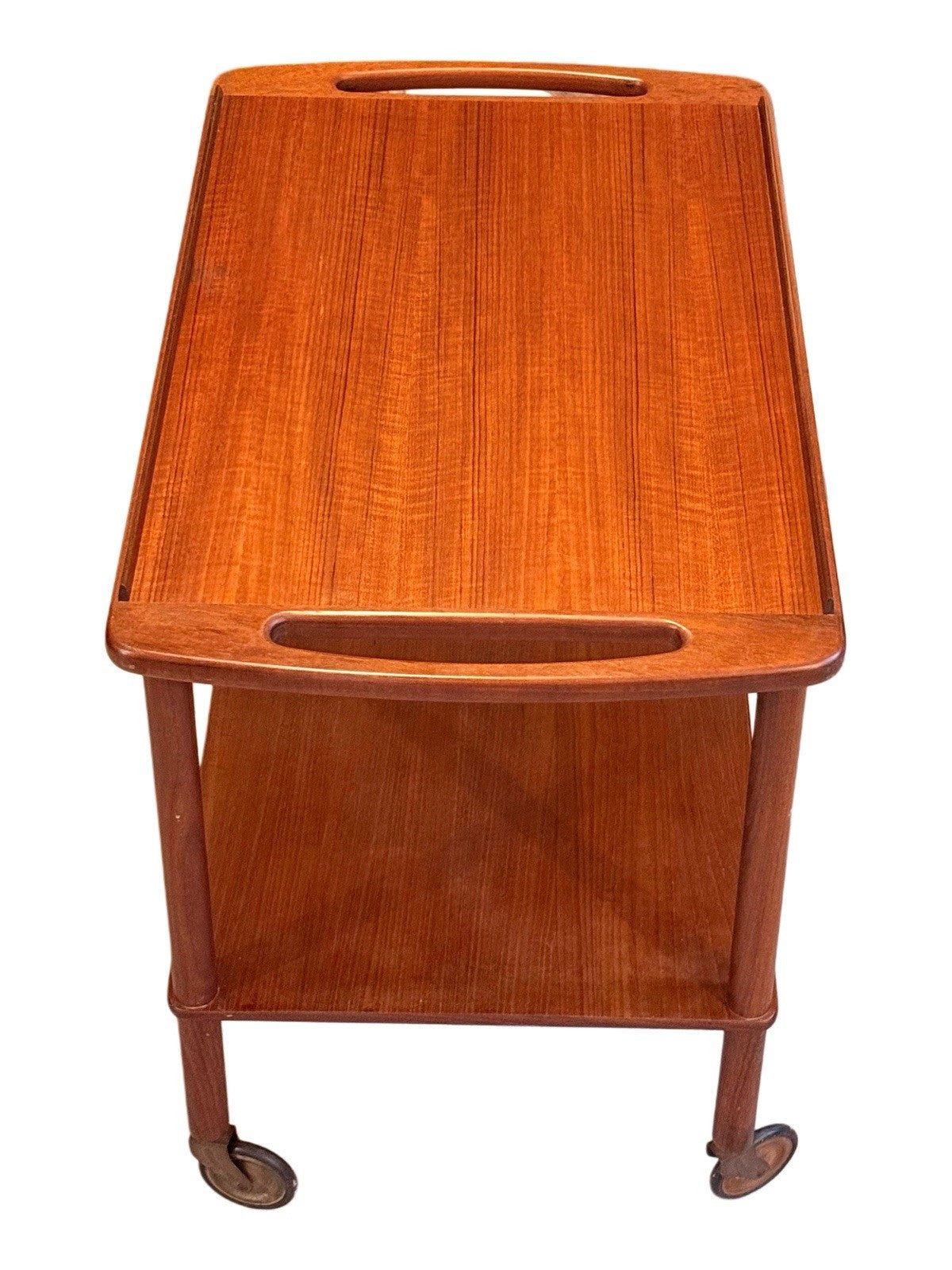 Bowa teak drinks trolley, end view showing cut-out handle
