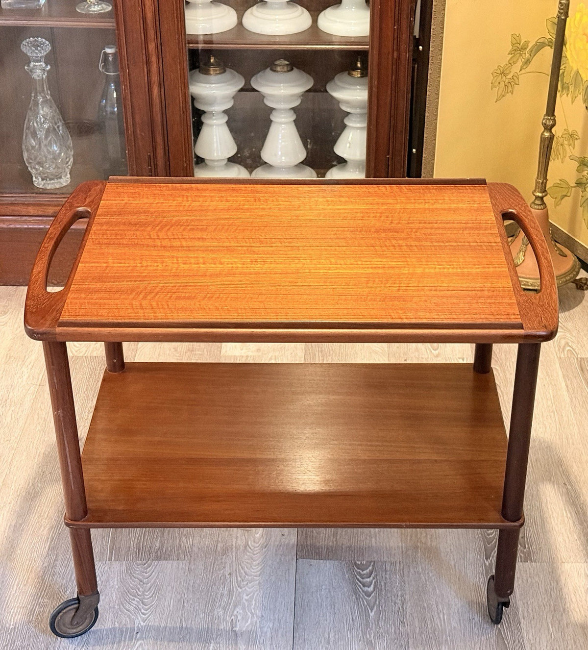 Danish teak bar cart by Bowa, front view in a room