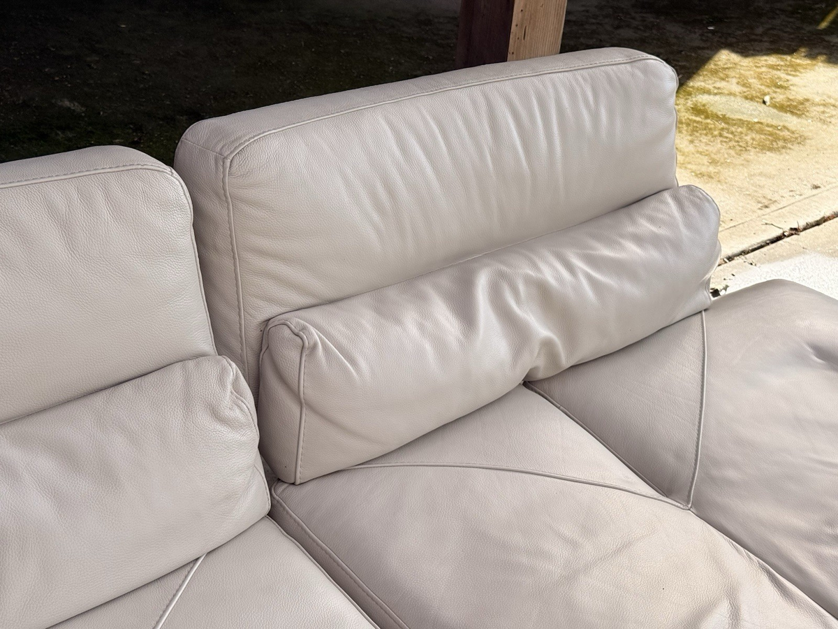 Close-up of ivory leather backrest and quilted seat