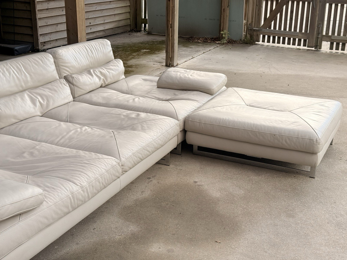 Roche Bobois Scénario ivory leather modular sofa with ottoman, angled view