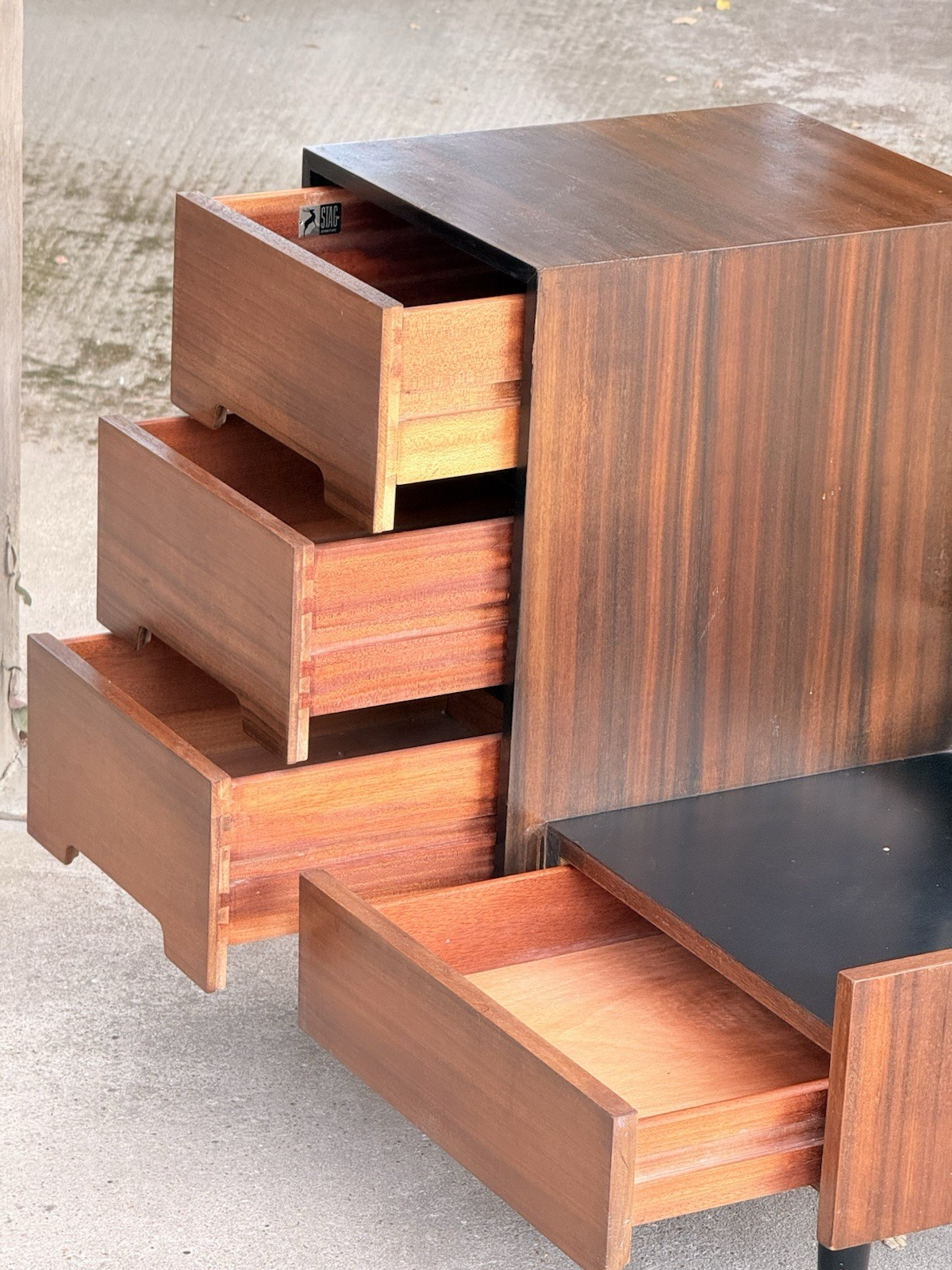 Stag afromosia dressing table with drawers pulled open