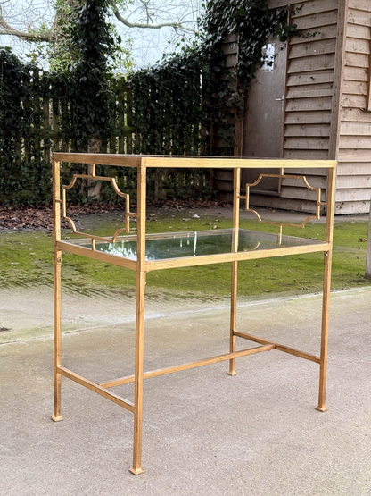 Uttermost Genell gold two-tier glass side table, end view
