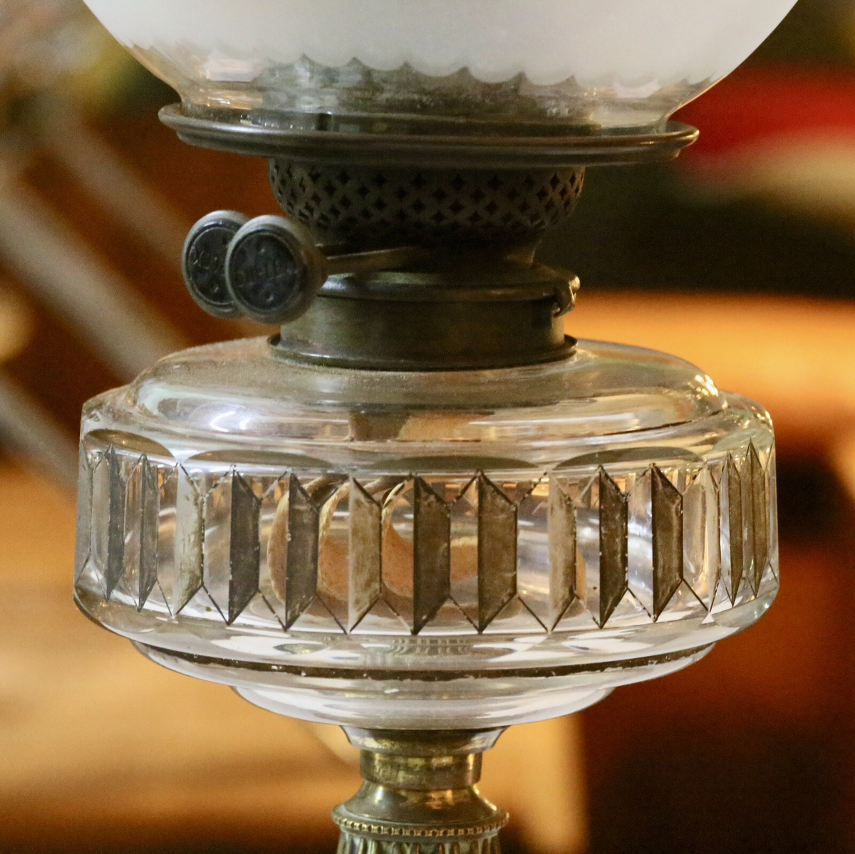 Close-up of burner and faceted crystal glass reservoir