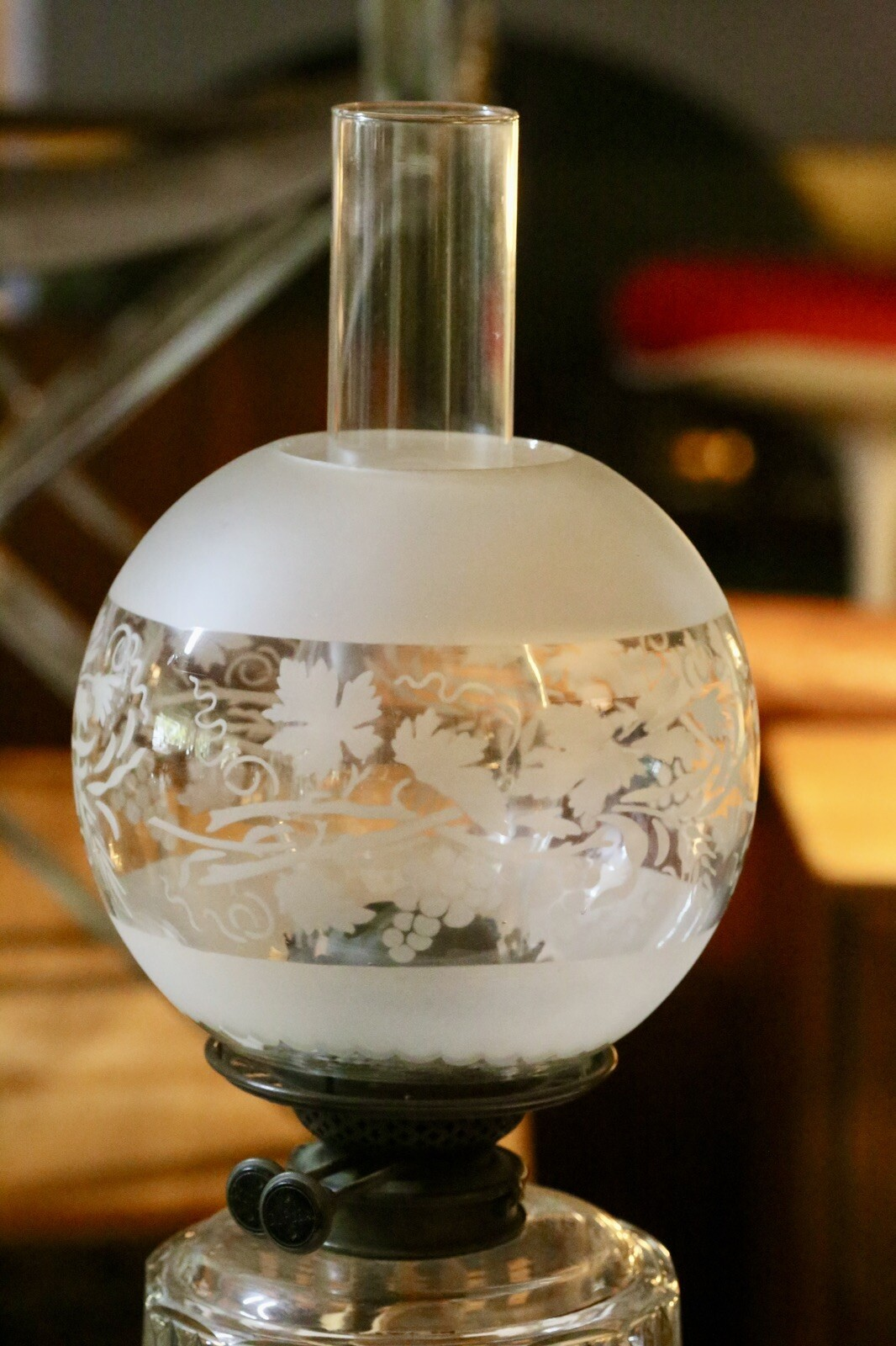 Close-up of the etched frosted glass globe shade with chimney