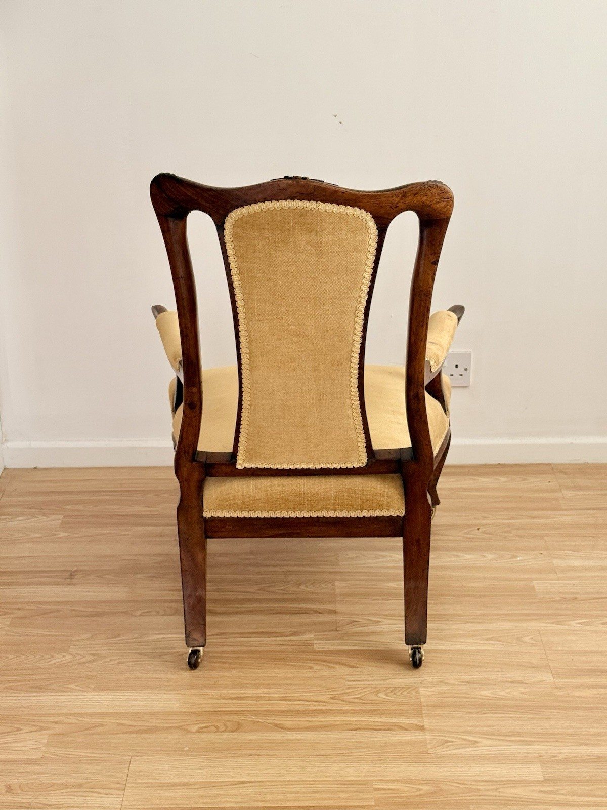 Back view of the Victorian carved rosewood lounge armchair