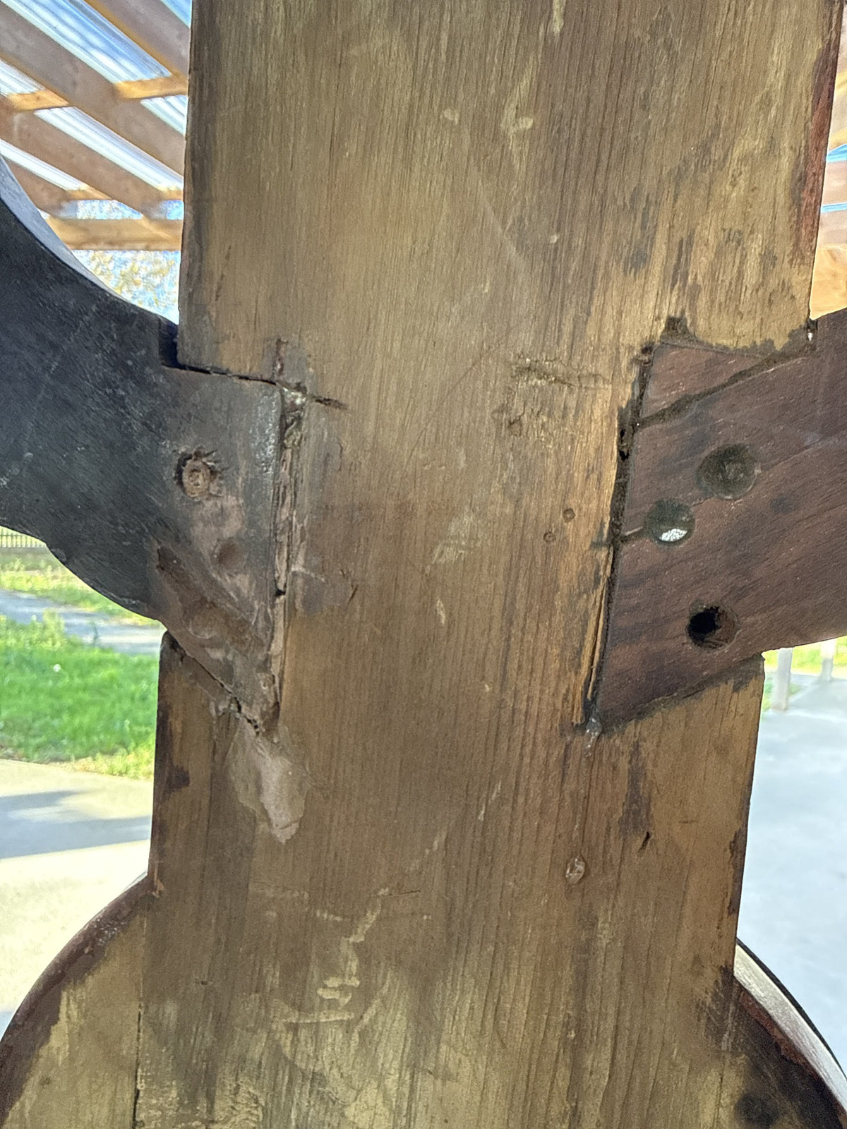 Rear of the hall stand column showing the old repairs where the arms join