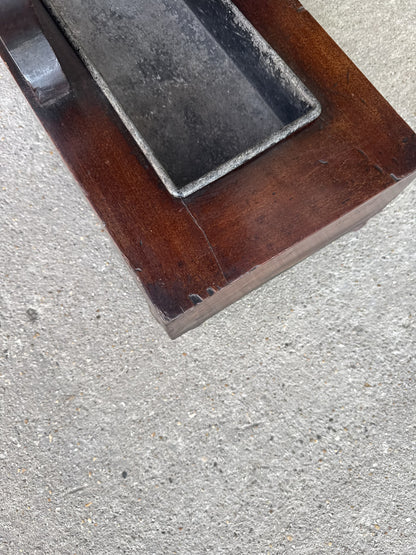 Original long zinc drip tray in the plinth base of the Victorian hall stand