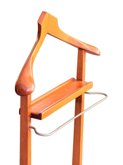 Valet stand shaped coat hanger with rounded shoulders, accessory tray and metal trouser bar