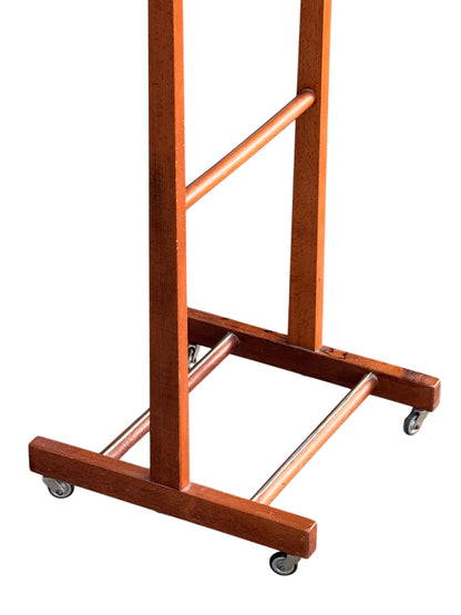 Valet stand base with two metal tie bars, wooden shoe rail and four castors