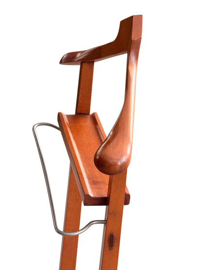 Valet stand with brushed metal trouser bar swung out on its pivot